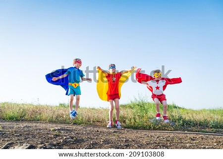 children acting like a superhero children acting like a superhero