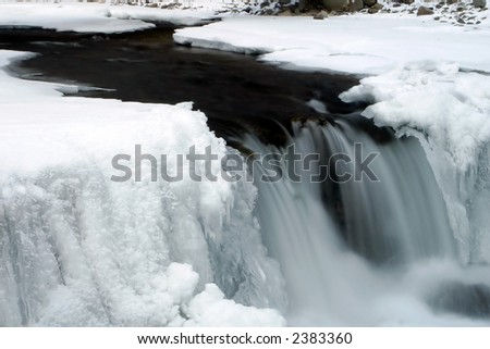 Waterfall with snow and ice