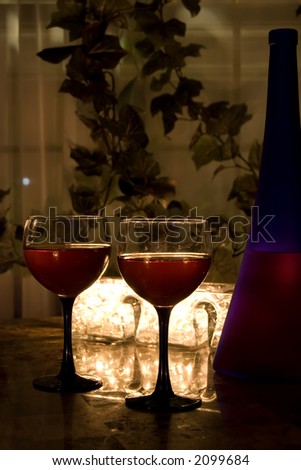 Late night wine by candlelight for two.
