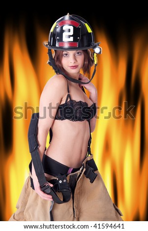 Sexy Female Firefighter in turnout gear and helmet.