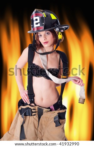Sexy Female Firefighter in fire gear and bra