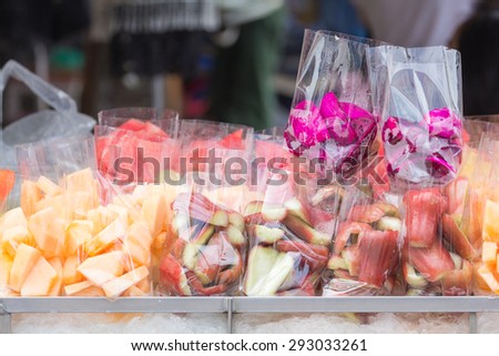Thailand street food including cantaloupe,watermelon,rose apple and dragon fruit in plastic bag ready for sale.