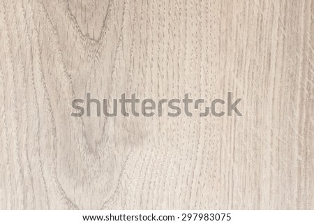 Soft tone wood laminate texture and seamless background.
