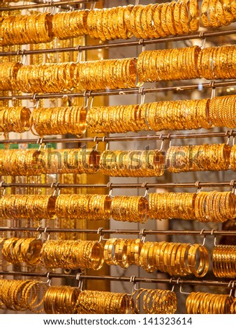 Gold bangles in a Dubai gold souk. United Arab Emirates