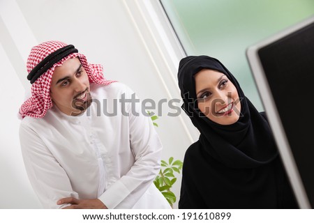 Arabic Business Couple Working In Office