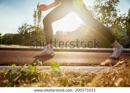 Woman Ready To Run On Jogging Track