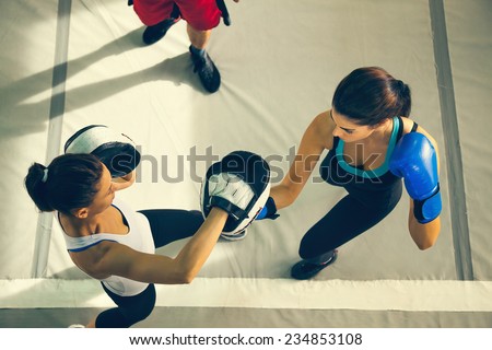 Two Female Boxers Sparring