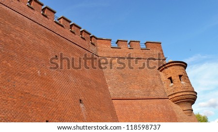 Fragment of walls of Wawel Castle, Krakow, Cracow. Poland. Red brick, gothic, defensive wall fortification.