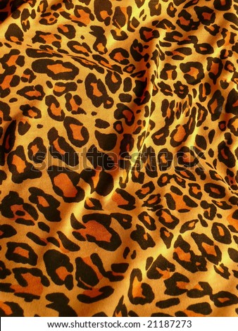 Tiger speckles textile closeup background. More of this motif & more fabrics in my port.
