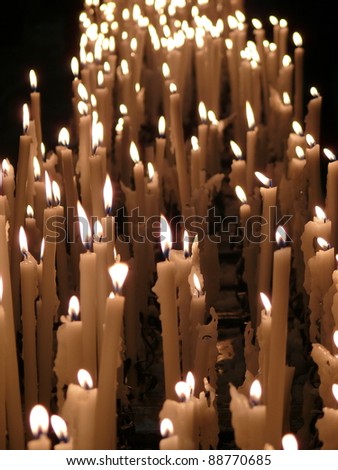 Candles in a church. Duomo Cathedral in Milan. Italy.
