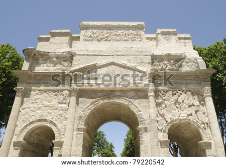 front of roman triumph arch in Orange city, France