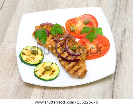 BBQ Steak. Barbecue Grilled Beef Steak Meat with Vegetables. Horizontal photo.
