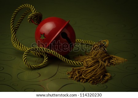 Red Bell with gold rope