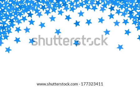 Blue stars in the form of confetti on white background