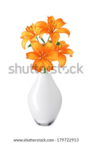 Beautiful orange lily flowers in vase isolated on white background
