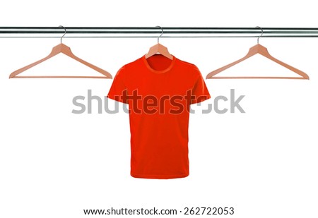 red t-shirts on hangers isolated on white background