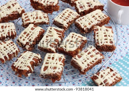 Brownies or cake bars covered in white chocolate