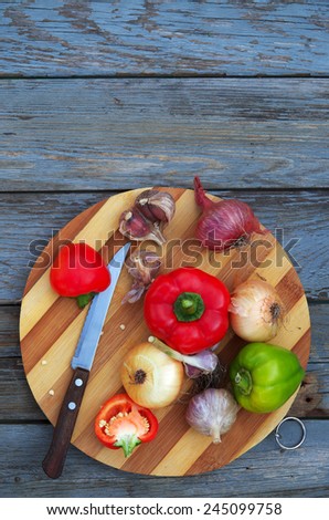 Food background. Fresh vegetables on an old wooden table. Cover for the book.