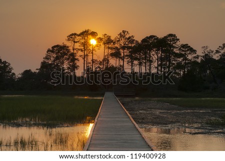 The sun sets over the salt marsh off Hunting Island, South Carolina.