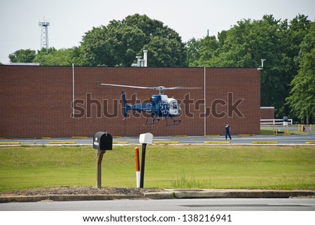 AIKEN, SOUTH CAROLINA - MAY 11: An emergency helicopter and crew respond to a call at a local seed packaging plant on May 11, 2013 in Aiken, South Carolina.