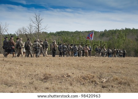 Confederate rebels form a battle line.