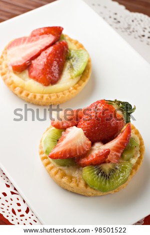 Sweet little fruit tart with kiwi and strawberries