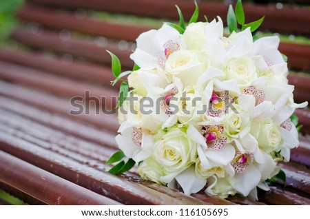 Bouquet of orchid flowers and roses