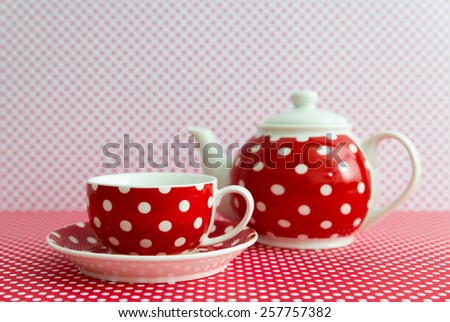Red tea set with white dots