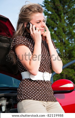 Adult caucasian woman in her car breaks down. Engine failure.