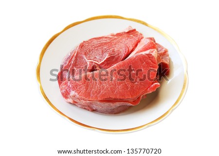 Raw meat on china ware isolated on white background