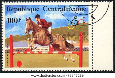 CENTRAL AFRICAN REPUBLIC - CIRCA 1983: A stamp printed in CENTRAL AFRICAN REPUBLIC  shows a  Show jumping, from series Equestrianism, circa 1983