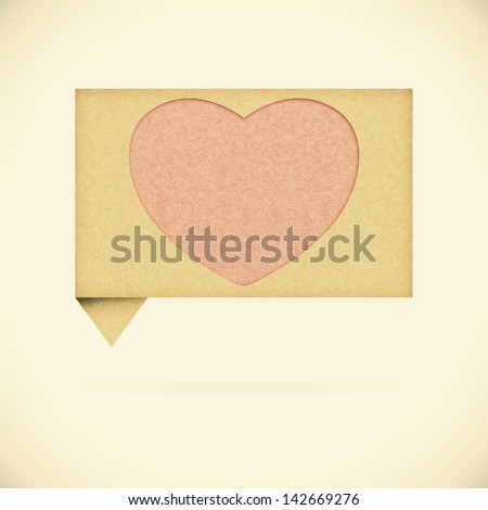 Heart tag recycled paper on vintage tone  background