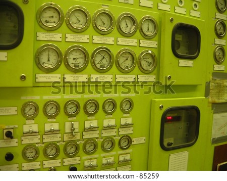 Dials clocks gauges control panel dashboard Green nuts bolts valves