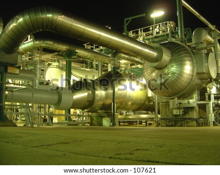 Industry at night pipes metal lights tubes color big sky machine chemical plant power
