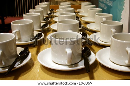 tea coffee cups row spoons break drink white china mugs hot many