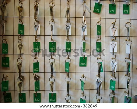keys tags numbers cabinet hooks many metal locks rack