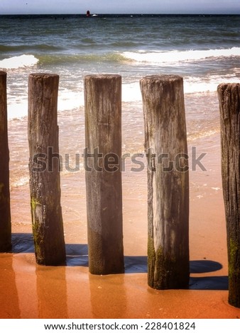 wooden trunks, wave breakers background