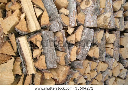 Alternative energy - fresh cutted heating wood - stocked for drying