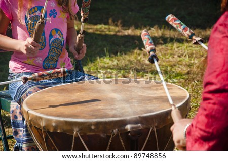 Drummers beat the Native American drum