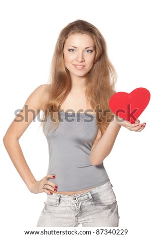 Closeup portrait of young female holding heart shape isolated on white background