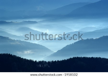 A view from mountains to the valley covered with smog
