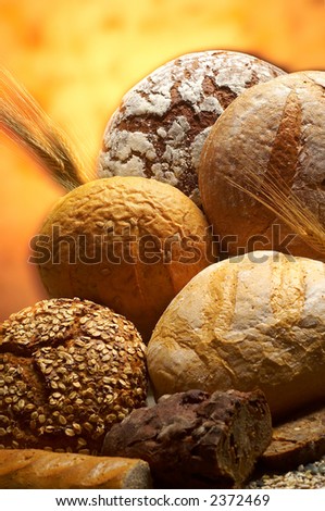 Group of different bread products photographed with light brush