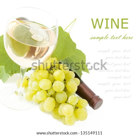 Glass of wine, grapes branch, fresh green leaves and wine bottle isolated on white with sample text