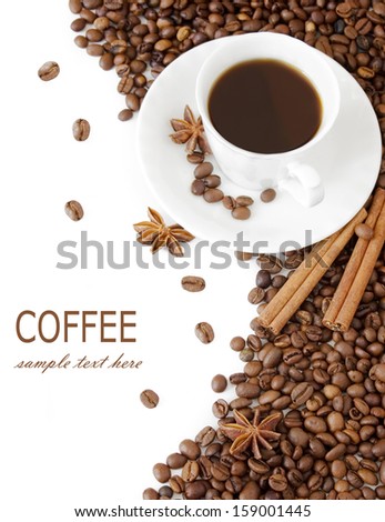 Coffee beans with cup of coffee and spice isolated on white with sample text
