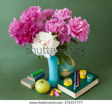 World teacher\'s day (still life with bunch of flowers and books)