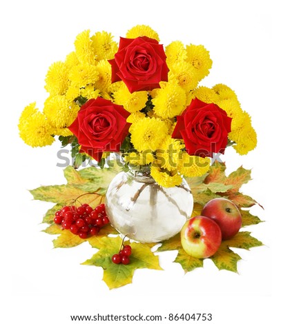 Huge bunch of autumn flowers and red roses isolated on white with autumn maple leaves, apples and red berries of viburnum