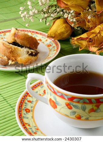 coffee or black tea with cake and dried flowers decoration