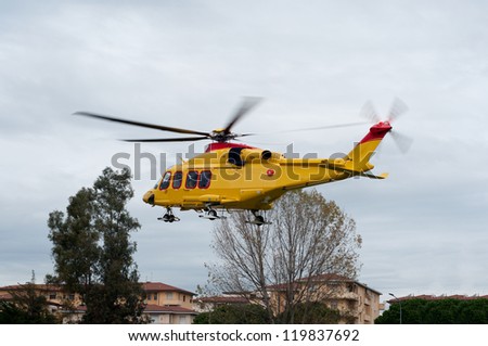 Medical Evacuation helicopter taking off from urban zone.