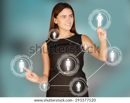 Girl touches the human icons and gears.