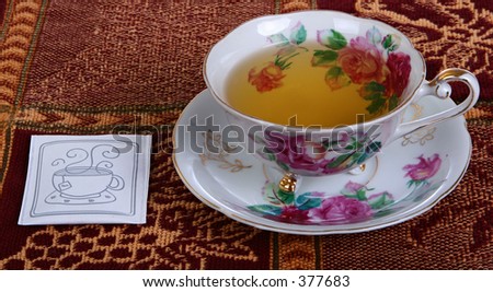 Tea packet and tea cup
